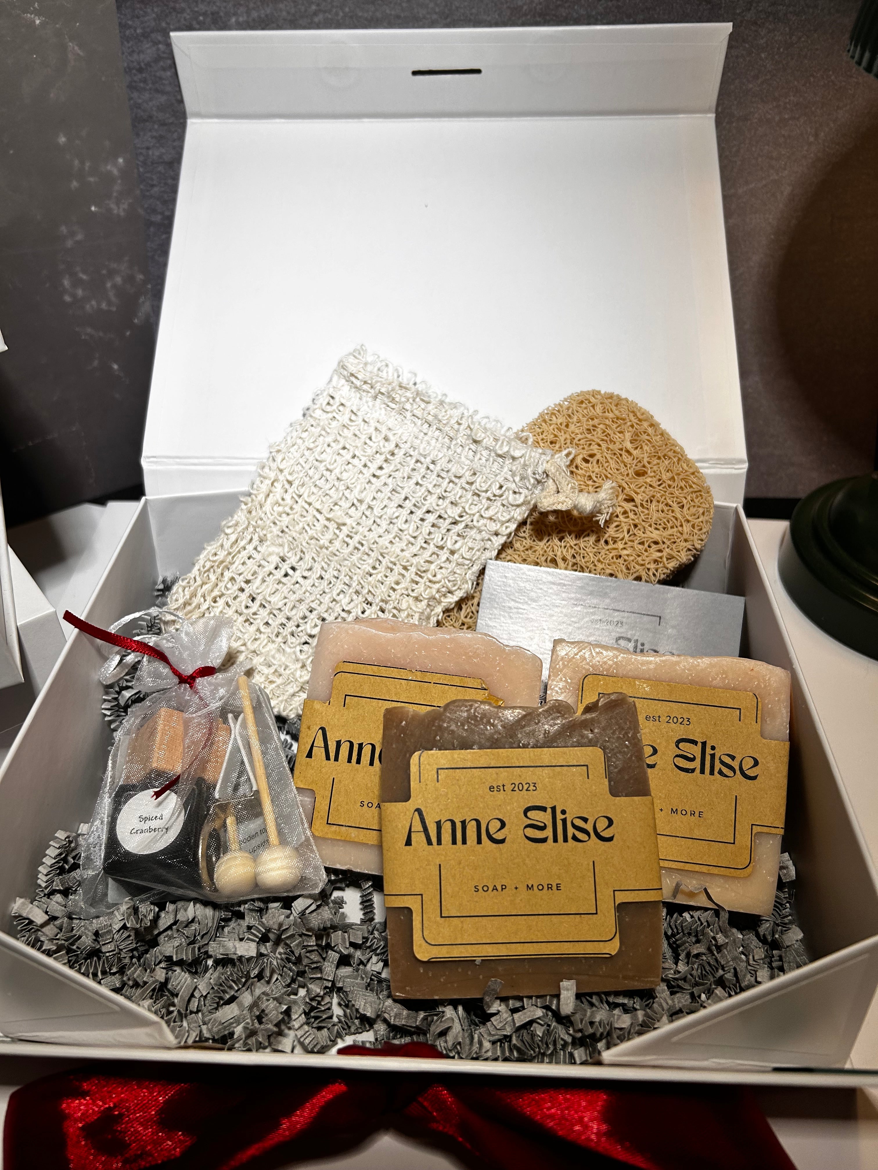 Gift box- 3 bars of soap, exfoliating bag, soap saver & car air